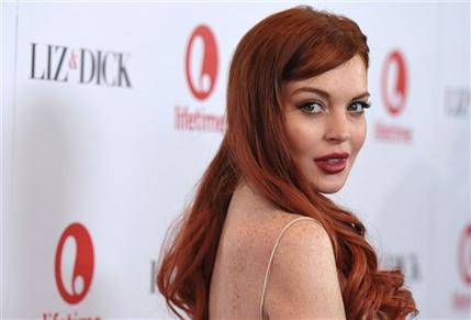 Lohan deslumbra en alfombra roja de “Liz & Dick”