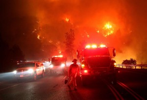 Cal Fire firefighters battle the Rocky Fire on August 2, 2015 near Clearlake, California. Over 1,900 firefighters are battling the Rocky Fire that burned over 22,000 acres since it started on Wednesday afternoon. The fire is currently five percent contained and has destroyed at least 14 homes.  (Justin Sullivan/Getty Images)
