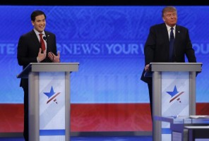 Republican presidential candidate Senator Marco Rubio (L) reacts to an attack from rival candidate and businessman Donald Trump (R) during the Republican U.S. presidential candidates debate sponsored by ABC News at Saint Anselm College in Manchester, New Hampshire February 6, 2016. REUTERS/Carlo Allegri