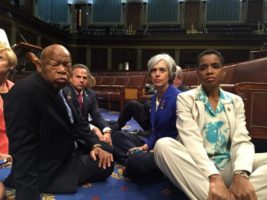 A photo tweeted from the floor of the U.S. House by Rep. Donna Edwards (R) shows Democratic members of the U.S. House of Representatives, including herself and Rep. John Lewis (L) staging a sit-in on the House floor "to demand action on common sense gun legislation" on Capitol Hill in Washington, United States, June 22, 2016.  REUTERS/Rep. Donna Edwards/Handout