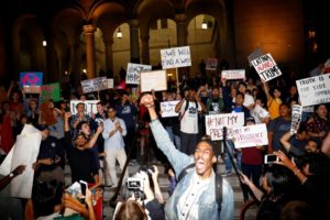 Demonstrators protest outside of City Hall following the election of Donald Trump in downtown Los Angeles. REUTERS/Patrick T. Fallon